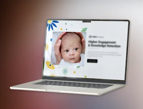 Laptop displaying a playful eLearning interface with a baby photo, for kids health related training for a giant healthcare client.