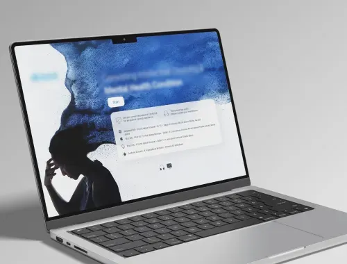 Laptop displaying a course screen for healthcare client with a mental health related image.